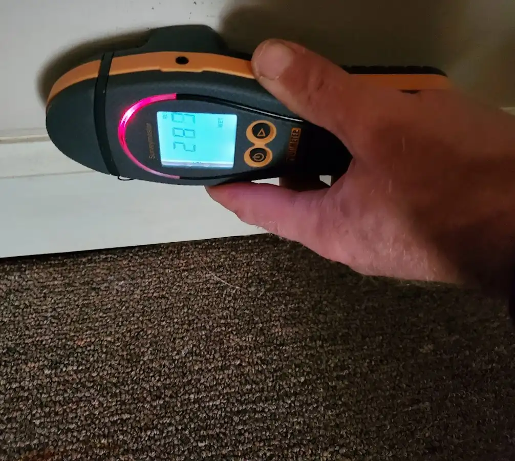 Moisture detection at baseboard during Storm Damage Restoration in Los Alamos